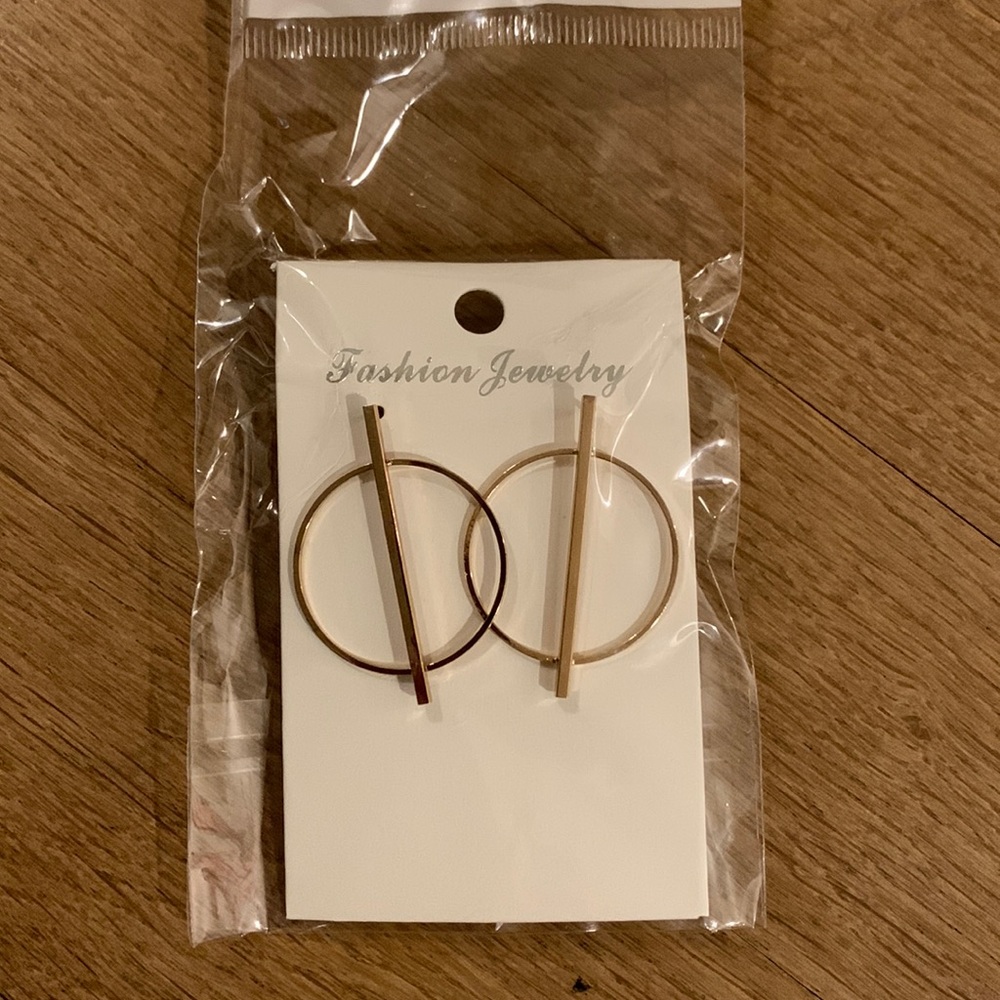 Gold geometric earrings by Mariz Artisan Jewelry